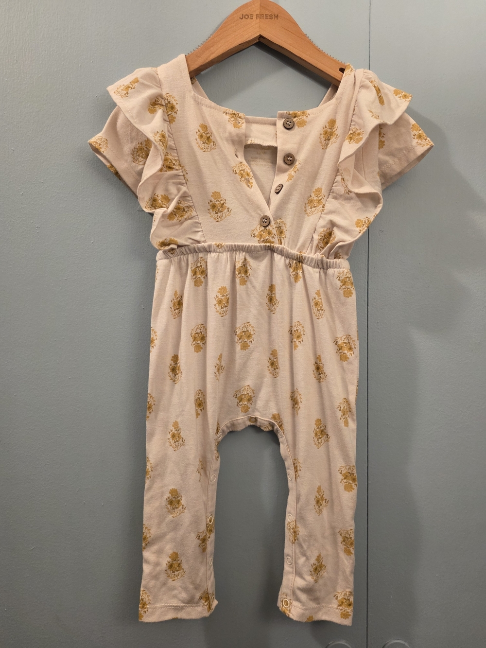 Jessica Simpson Cream Romper with Yellow Floral Print and Ruffle Sleeves